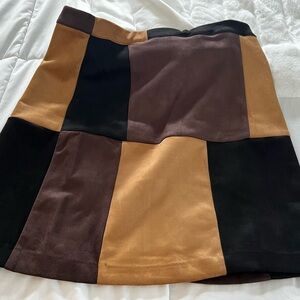 NWT new, Women’s size medium Patchwork suede mini Skirt - Black, Brown, Tan